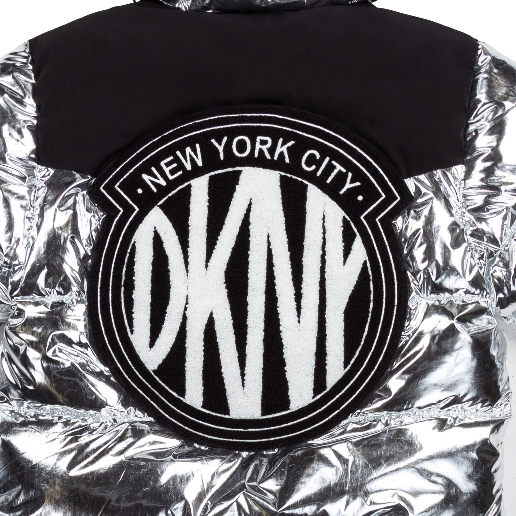 Plumífero reversible capucha DKNY para NIÑA