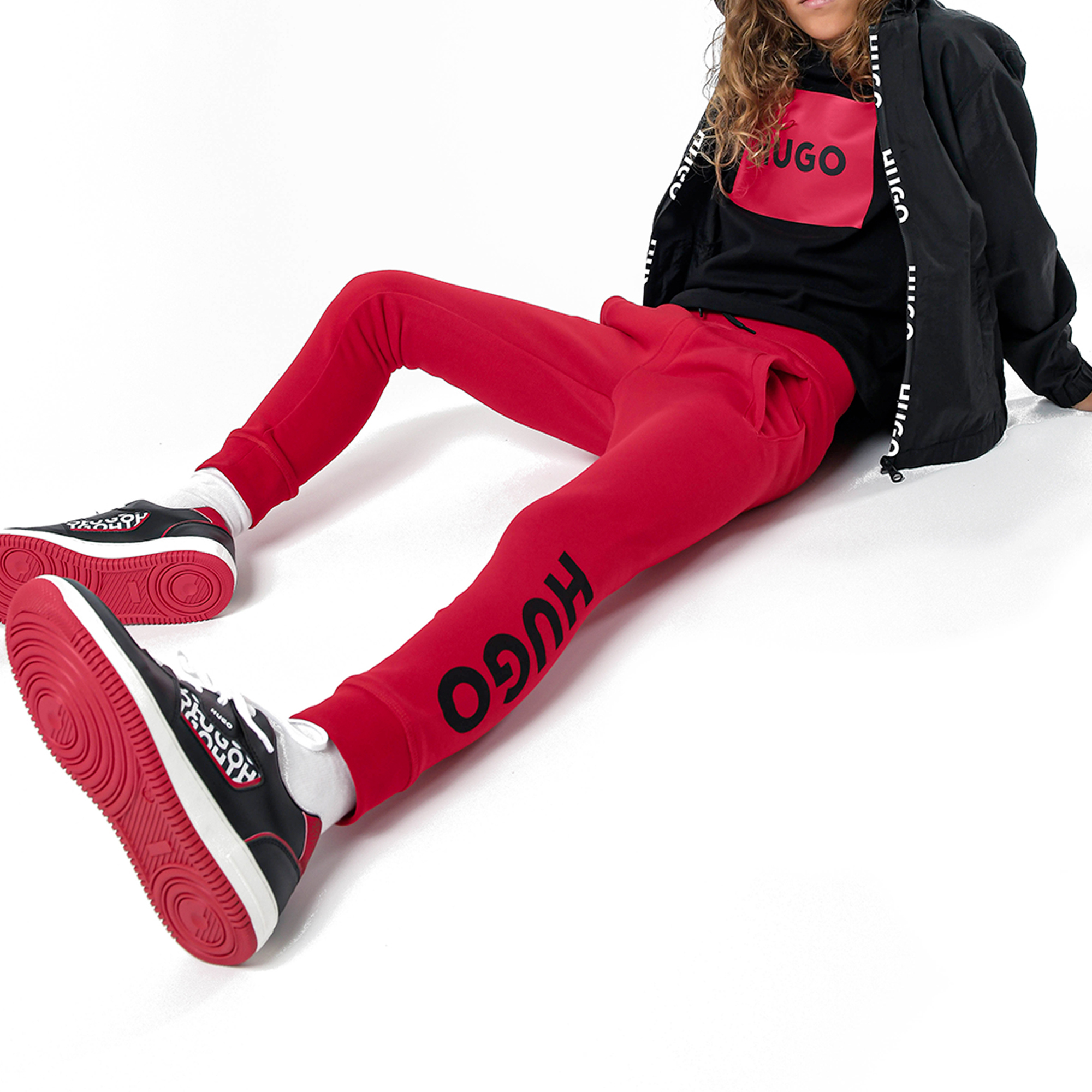 Jogging trousers with logo HUGO for BOY