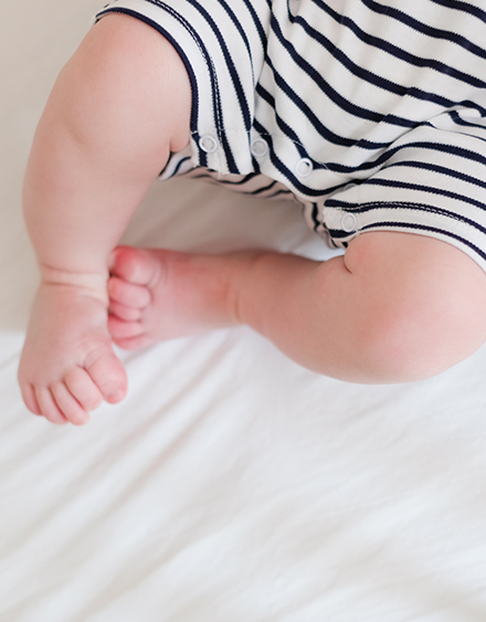 white and navy striped bodysuit from Carrément Beau for baby