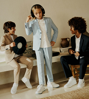 vêtements pour enfant garçon et fille de la marque premium BOSS sur Kids around